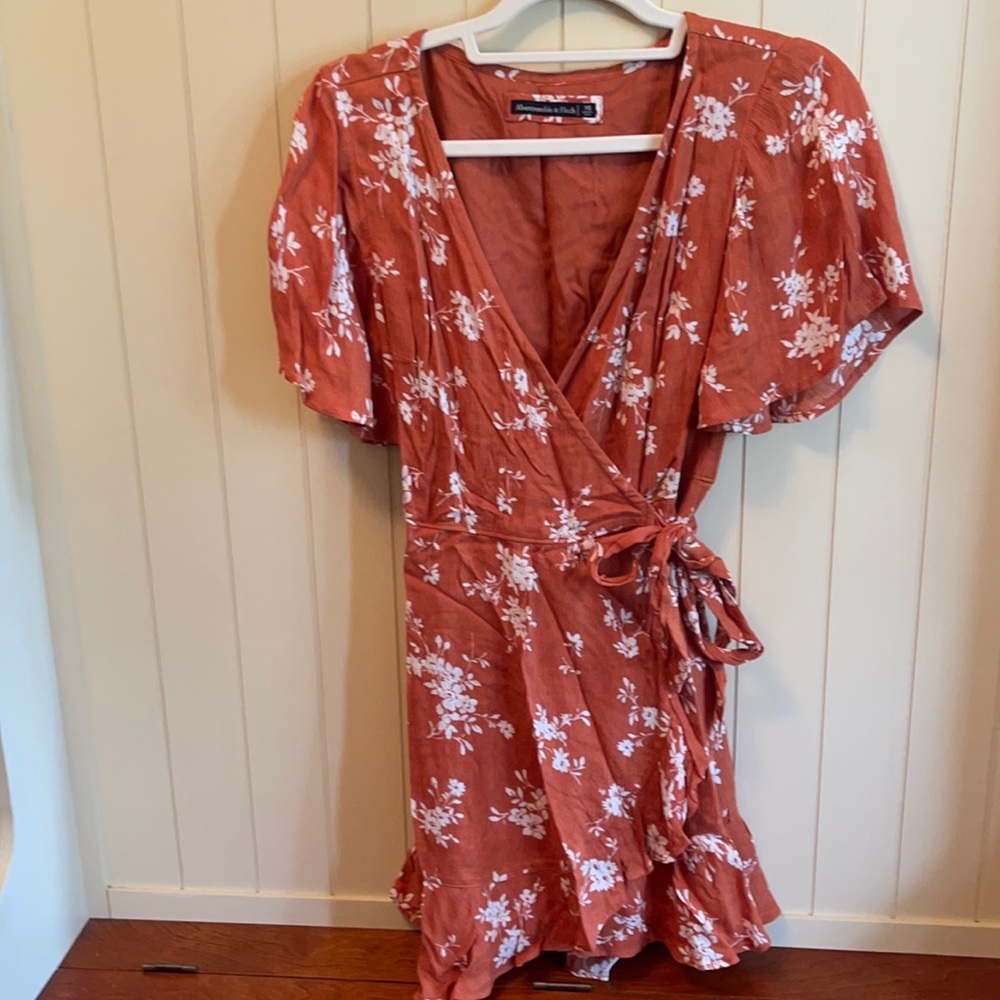 Orange floral sun wrap dress with flutter sleeves